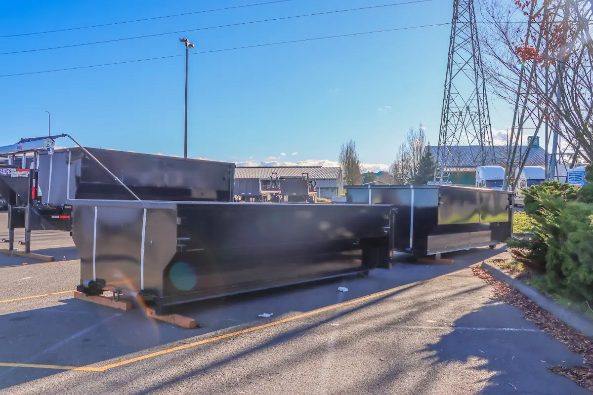 Roll-off dumpster ready for waste disposal at job site for 30 Yard Dumpster Rental in Red Bank